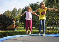 two kids on trampoline