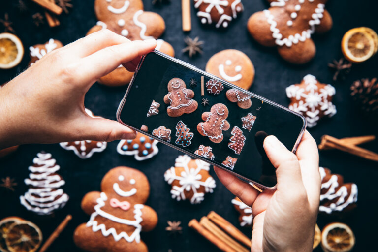 Smart phone taking photo of holiday cookies