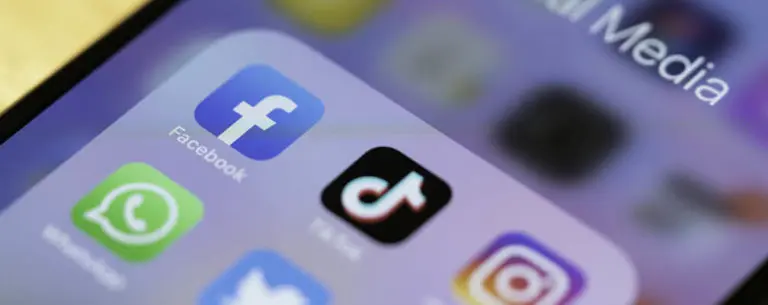 iPhone screen displaying different social media apps