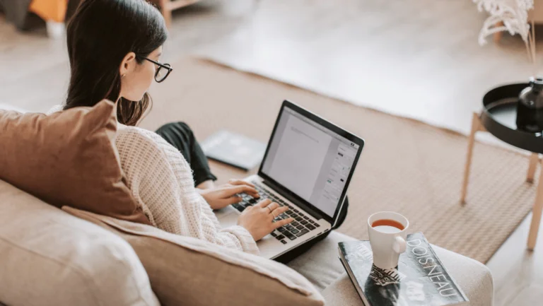 woman on laptop visiting attorney website