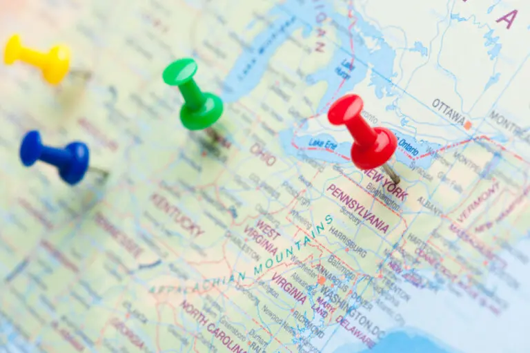 pushpins on map showing law firms targeting multiple states